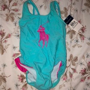 Ralph Lauren swimsuit with ruffled detail on hips and a clasp back